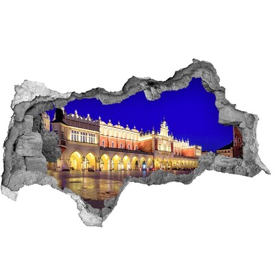 Hole wall sticker Krakow's Main Market Square at night