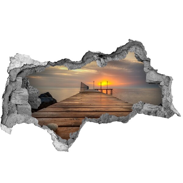 Hole in the wall sticker Sunset over the pier