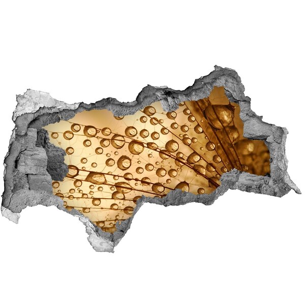 Hole in the wall decal A golden drop on the concrete background