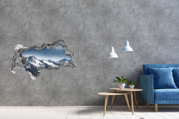 Hole in the wall sticker Mountain landscape with a paraglider