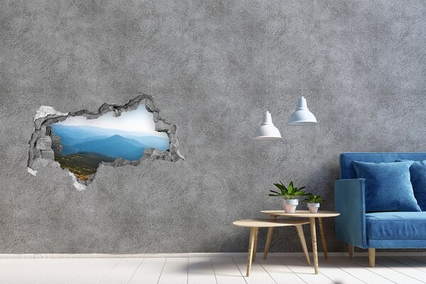 Hole wall sticker Mountain landscape behind the hole in the wall