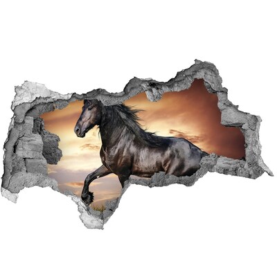 Hole in the wall sticker Wild horse against the sunset background