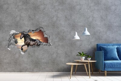 Hole in the wall sticker Wild horse against the sunset background
