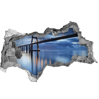 Hole in the wall decal A bridge over the water in a night scene