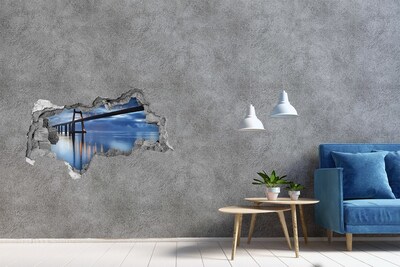 Hole in the wall decal A bridge over the water in a night scene