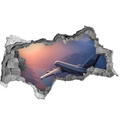 Hole in the wall sticker Flight over the mountains