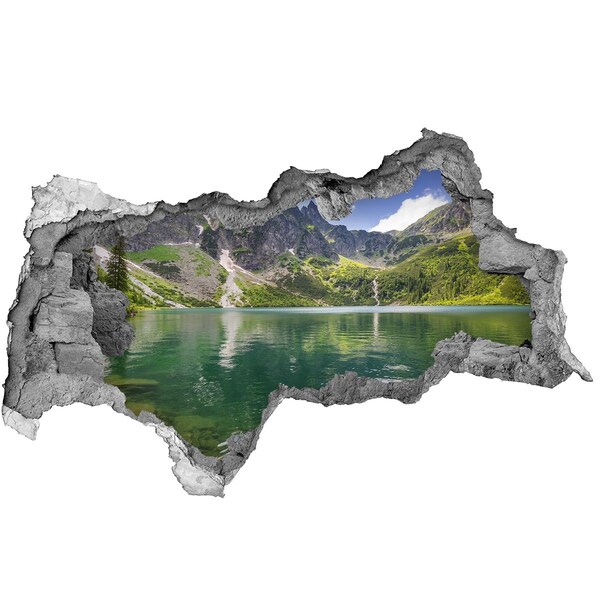 Hole wall sticker Mountain lake in the valley