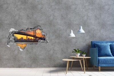 Hole wall sticker Sunset over the bridge