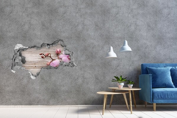 Hole in the wall sticker Orchid flowers on a wooden background