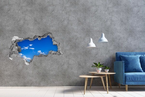 Hole in the wall sticker Blue sky with clouds