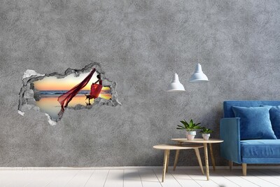 Hole wall sticker Dancing on the beach at sunset