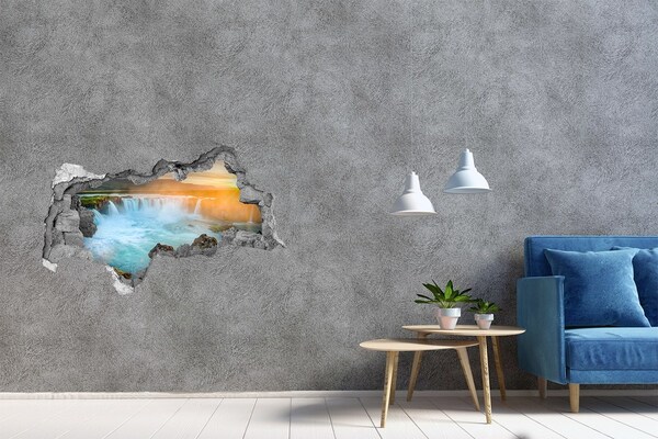 Hole in the wall sticker Waterfall in the setting sun