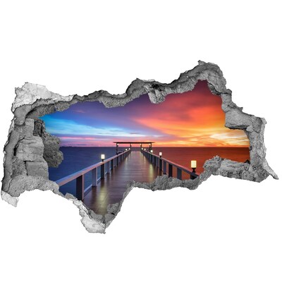 Hole in the wall sticker Sunset over the pier