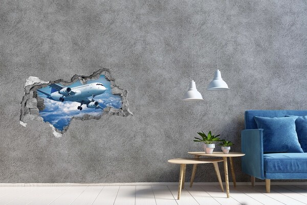 Hole in the wall decal Arrival of a plane in the clouds
