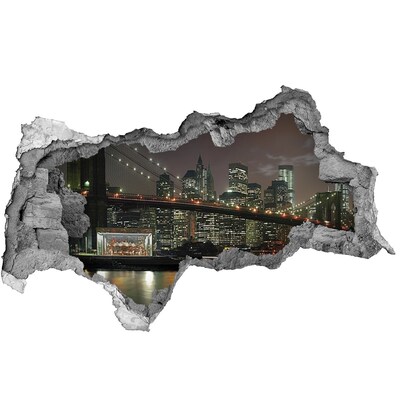 Hole wall sticker New York at night through a hole in the wall