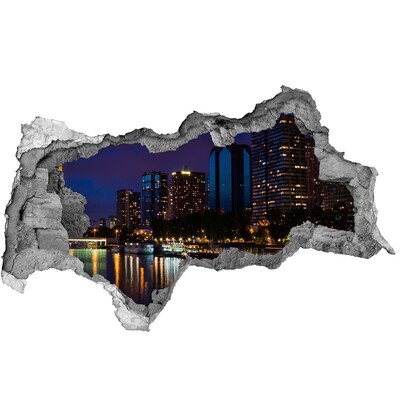 Hole in the wall sticker Night panorama of the city