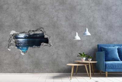 Hole in the wall sticker Night view of the sea