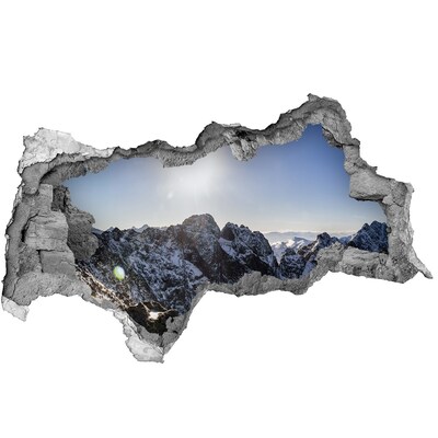 Hole in the wall sticker Mountain landscape with sun rays