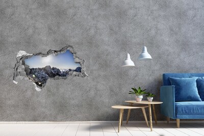 Hole in the wall sticker Mountain landscape with sun rays