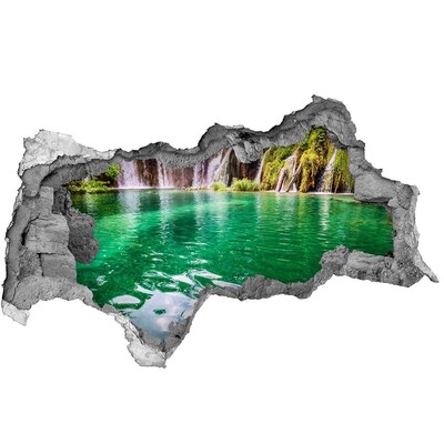 Hole in the wall sticker Tropical paradise with a waterfall