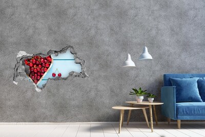 Hole wall sticker Sweet cherries on a blue background