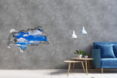 Hole in the wall sticker Blue sky with clouds