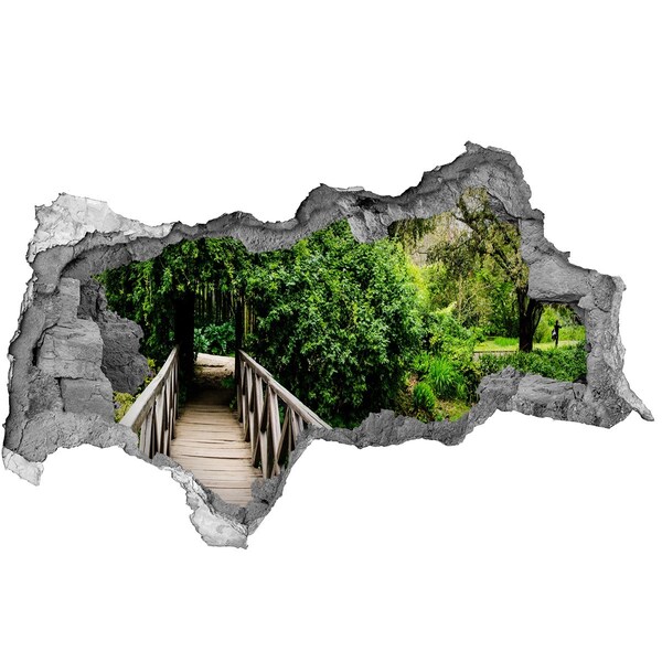 Hole wall sticker A green paradise with a wooden bridge