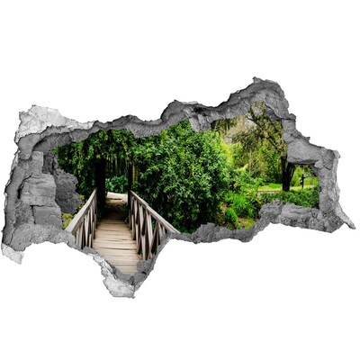 Hole wall sticker A green paradise with a wooden bridge