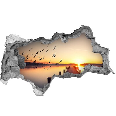Hole wall sticker Sunset over the lake