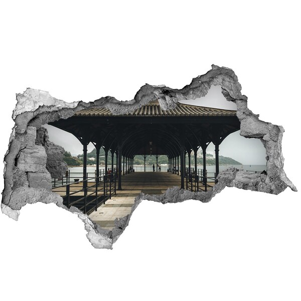 Hole in the wall sticker View of the pier over the water