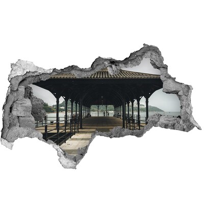 Hole in the wall sticker View of the pier over the water