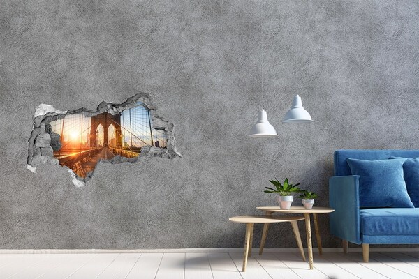 Hole wall sticker Brooklyn Bridge at sunset