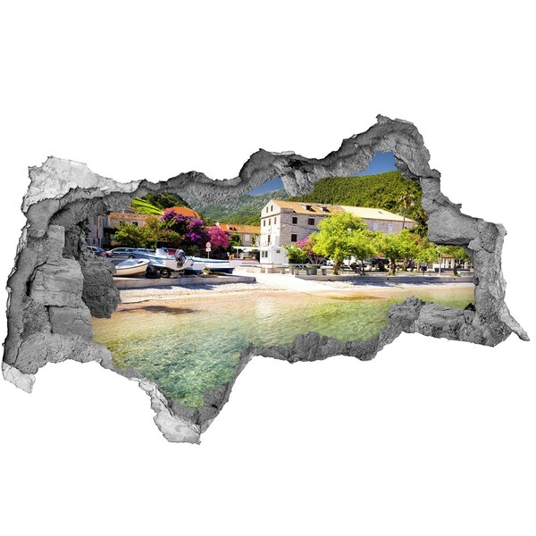 Hole in the wall sticker A seaside landscape with a charming village