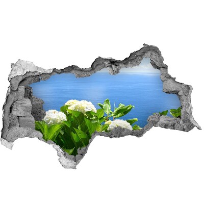 Hole wall sticker View of the sea through a hole in the wall