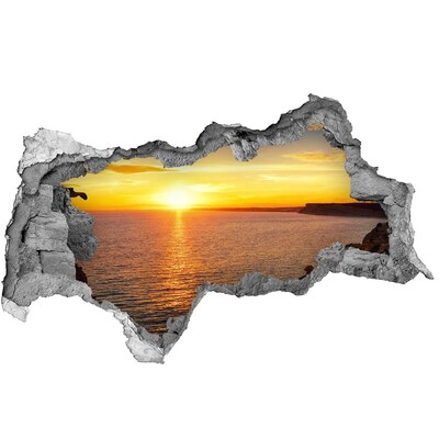 Hole wall sticker Sunset over the sea