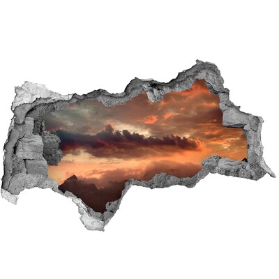 Hole in the wall sticker Sunset in the mountains