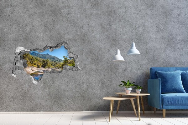Hole wall sticker Mountain landscape behind the hole in the wall