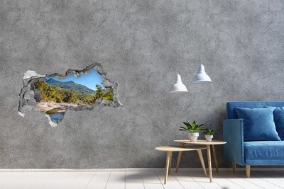 Hole wall sticker Mountain landscape behind the hole in the wall