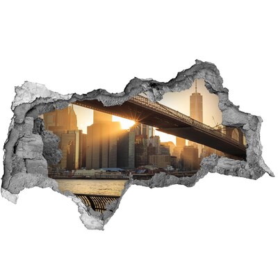 Hole wall sticker Bridge in the setting sun