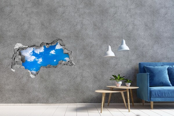 Hole in the wall sticker Blue sky with clouds
