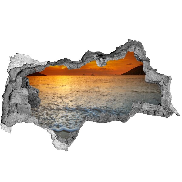 Hole wall sticker Sunset over the sea