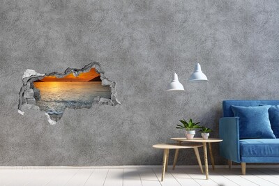 Hole wall sticker Sunset over the sea