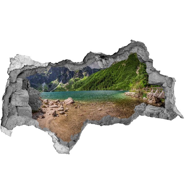 Hole wall sticker Mountain lake in the valley