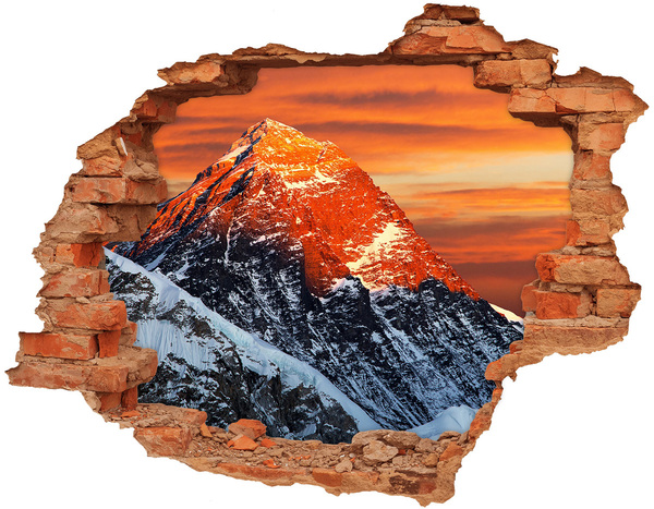 Hole wall sticker Mountains in the setting sun