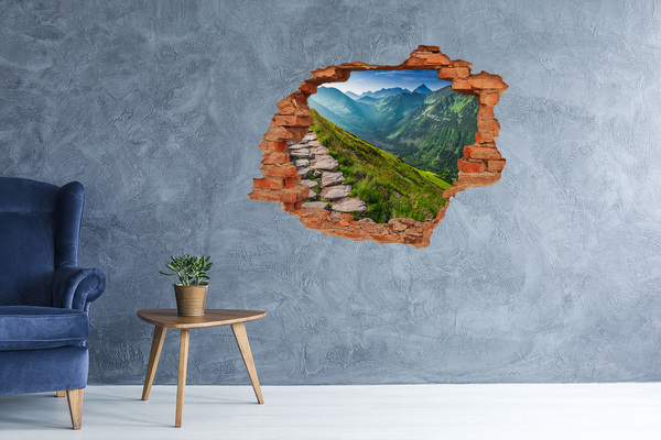 Hole in the wall sticker Mountain landscape behind the hole in the wall