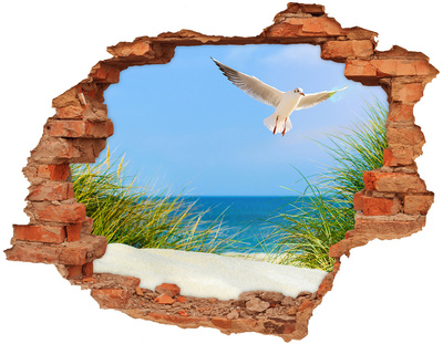 Hole wall sticker View of the beach with a seagull