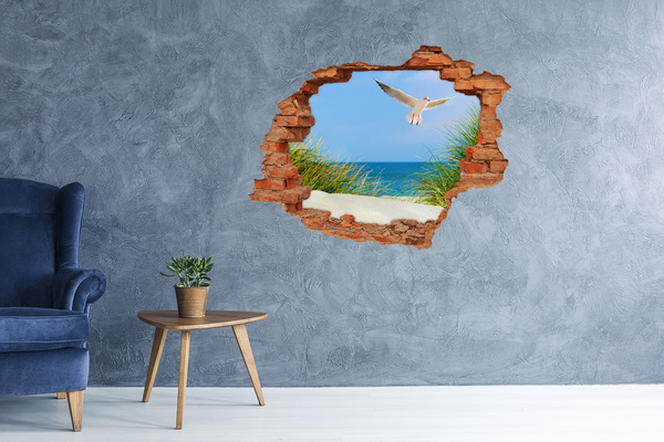Hole wall sticker View of the beach with a seagull