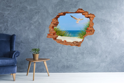 Hole wall sticker View of the beach with a seagull