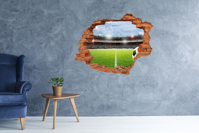 Hole in the wall sticker Football stadium from behind the wall