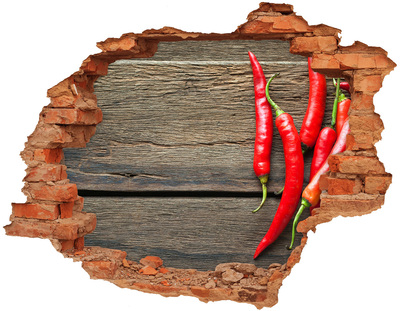 Hole in the wall sticker Chili peppers on a wooden surface